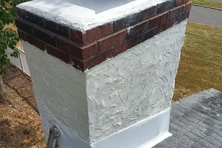 Sealed and waterproofed chimney with a new crown on a Dallas home
